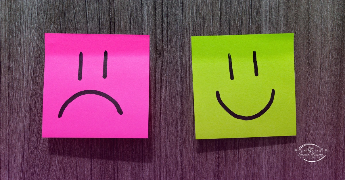 Sticky notes with sad and happy faces.