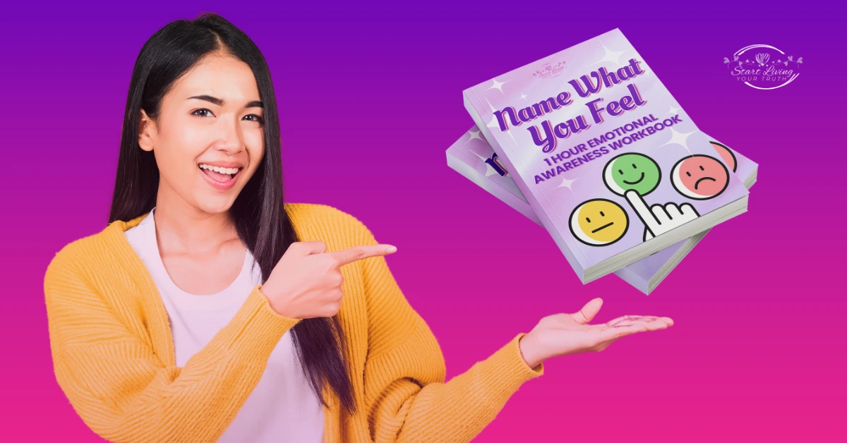Smiling woman pointing at emotional awareness workbook.