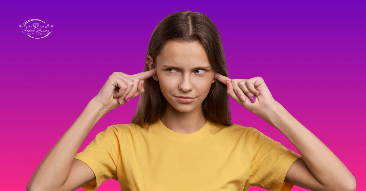 Woman in yellow shirt covering ears, gradient background.