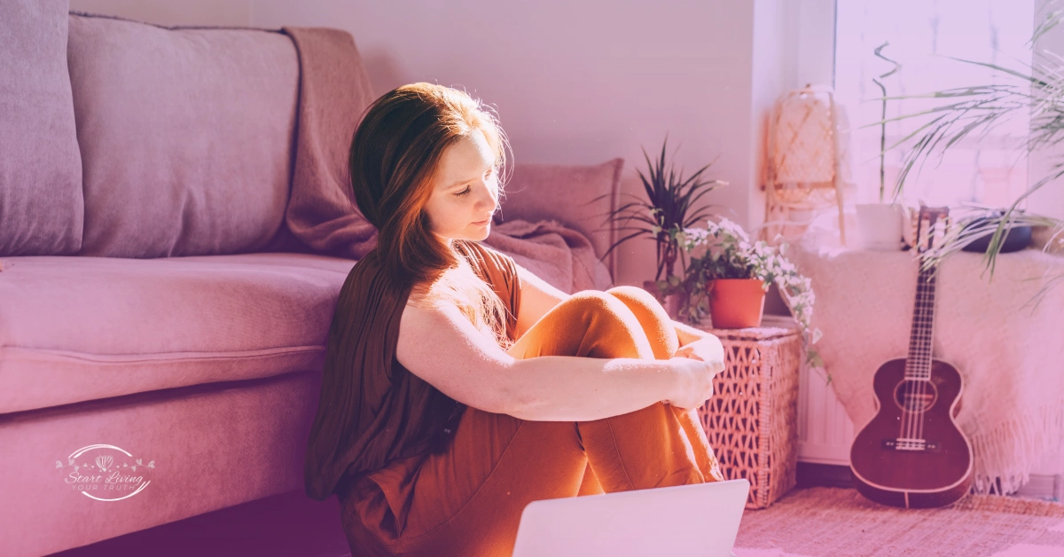 Woman relaxing in cosy living room with guitar.